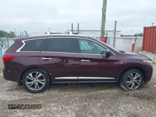 2015 Infiniti QX60 with VIN 5N1AL0MM7FC521700, listed as a IAAI auction lot 42310389 with 144,217 mi miles and . Bid and sale history available at DreamBid. Image 13.