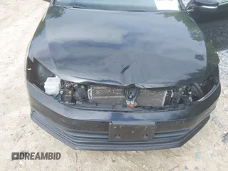 2015 Volkswagen Jetta SE z VIN 3VWD17AJ3FM252584, wystawiony jako IAAI lot #42257546 z przebiegiem 117 195 mil mil oraz . Historia ofert i sprzedaży dostępna na DreamBid. Obrazek 6.