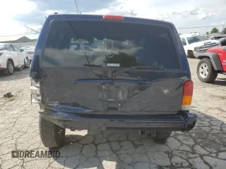 1997 Jeep Cherokee with VIN 1J4FN78S6VL604971, listed as a Copart auction lot 70690304 with 226,913 mi miles and Salvage title. Bid and sale history available at DreamBid. Image 6.