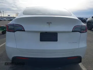 2025 Tesla Model Y Long Range with VIN 7SAYGDEE1SA343429, listed as a IAAI auction lot 41504455 with 1,284 mi miles and . Bid and sale history available at carsss.com. Image 16.