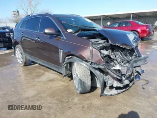 2016 Cadillac SRX Luxury Collection z VIN 3GYFNBE38GS527968, wystawiony jako IAAI lot #41684162 z przebiegiem 129 862 mil mil oraz . Historia ofert i sprzedaży dostępna na DreamBid. Obrazek 1.