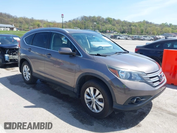 2014 Honda CR-V EX-L with VIN 5J6RM4H70EL096555, listed as a IAAI auction lot 42038062 with 113,601 mi miles. Bid and sale history available at carsss.com. Image 1.