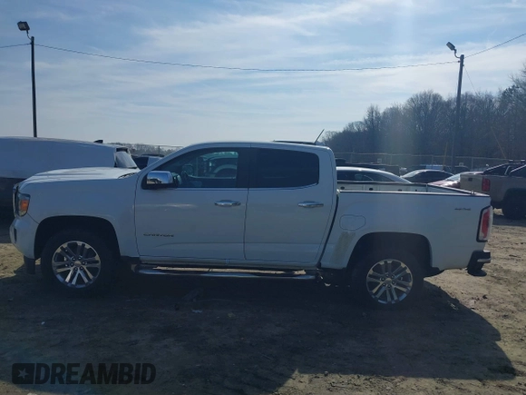 2015 GMC Canyon 4WD SLT with VIN 1GTG6CE30F1269698, listed as a IAAI auction lot 41508606 with 83,566 mi miles. Bid and sale history available at carsss.com. Image 14.