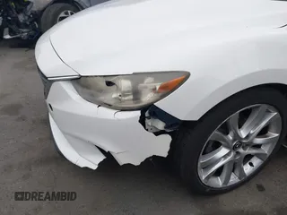 2016 Mazda Mazda6 i Touring with VIN JM1GJ1V52G1468807, listed as a IAAI auction lot 41888686 with 121,764 mi miles. Bid and sale history available at carsss.com. Image 17.