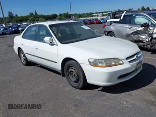 1999 Honda Accord LX with VIN JHMCG5640XC055216, listed as a IAAI auction lot 42828886 with 295,970 mi miles and . Bid and sale history available at DreamBid. Image 1.