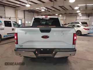 2015 Ford F-150 XL with VIN 1FTEX1CG5FKD31637, listed as a IAAI auction lot 41607827 with 201,278 mi miles. Bid and sale history available at carsss.com. Image 16.