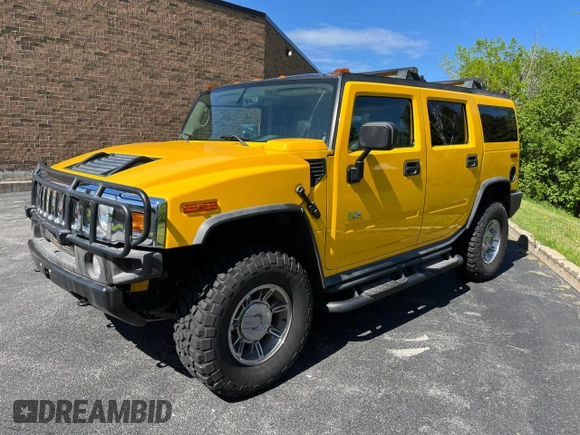 2003 Hummer H2 with VIN 5GRGN23UX3H112710, listed as a Copart auction lot 88229785 with 64,186 mi miles and Salvage Title. Bid and sale history available at carsss.com. Image 2.