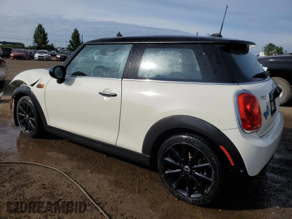 2016 MINI Hardtop with VIN WMWXP5C5XG2D15482, listed as a Copart auction lot 59652125 with 99,066 mi miles and Salvage title. Bid and sale history available at DreamBid. Image 2.