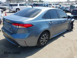 2020 Toyota Corolla Hybrid LE with VIN JTDEBRBE9LJ011672, listed as a IAAI auction lot 41832275 with 118,835 mi miles. Bid and sale history available at carsss.com. Image 4.