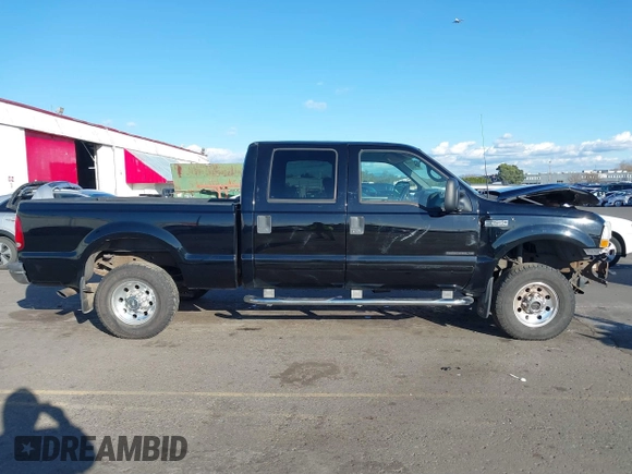 2002 Ford F-250 XL z VIN 1FTNW21F22EB74368, wystawiony jako IAAI lot #41636544 z przebiegiem 164 604 mil mil oraz . Historia ofert i sprzedaży dostępna na DreamBid. Obrazek 14.
