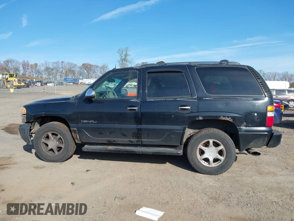 2005 GMC Yukon Denali z VIN 1GKEK63U55J254214, wystawiony jako IAAI lot #42103378 z przebiegiem 131 183 mil mil oraz . Historia ofert i sprzedaży dostępna na DreamBid. Obrazek 13.