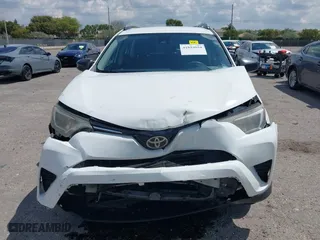 2017 Toyota RAV4 LE with VIN JTMZFREV2HJ711557, listed as a IAAI auction lot 41894094 with 167,645 mi miles. Bid and sale history available at carsss.com. Image 13.