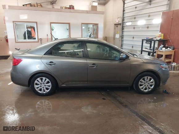 2012 Kia Forte EX with VIN KNAFU4A23C5492713, listed as a IAAI auction lot 41870006 with 133,313 mi miles. Bid and sale history available at carsss.com. Image 13.