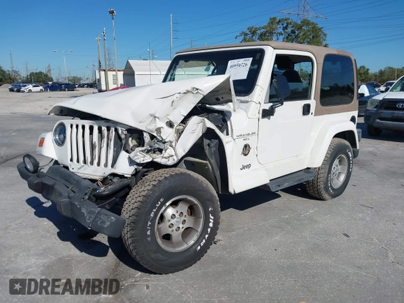 2001 Jeep Wrangler Sahara with VIN 1J4FA59S51P332107, listed as a IAAI auction lot 40954726 with 150,671 mi miles. Bid and sale history available at carsss.com. Image 17.