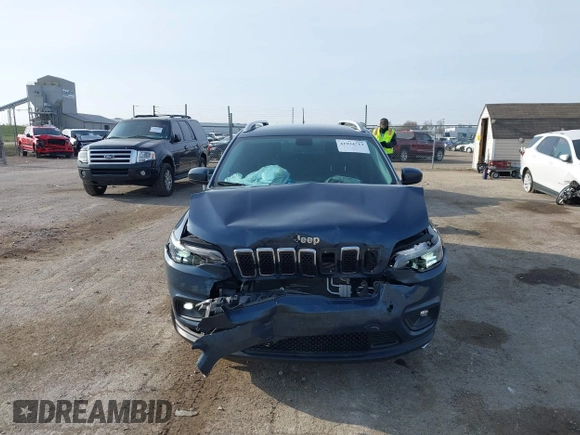 2019 Jeep Cherokee Latitude with VIN 1C4PJLCB2KD403788, listed as a IAAI auction lot 41934713 with 95,455 mi miles and . Bid and sale history available at DreamBid. Image 12.