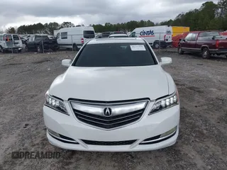 2014 Acura RLX with VIN JH4KC1F39EC004897, listed as a IAAI auction lot 41737436 with 101,104 mi miles. Bid and sale history available at carsss.com. Image 12.