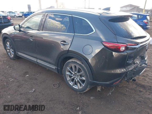 2019 Mazda CX-9 Grand Touring with VIN JM3TCBDY3K0331505, listed as a IAAI auction lot 41690517 with 64,520 mi miles. Bid and sale history available at carsss.com. Image 3.