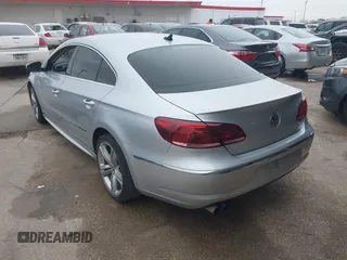 2014 Volkswagen CC Sport with VIN WVWBN7ANXEE501758, listed as a IAAI auction lot 41443518 with 193,259 mi miles and . Bid and sale history available at DreamBid. Image 3.