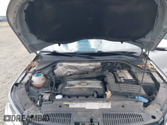 2013 Volkswagen Tiguan SEL with VIN WVGBV3AX1DW571843, listed as a IAAI auction lot 42540191 with 140,639 mi miles and . Bid and sale history available at DreamBid. Image 10.