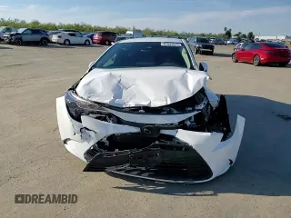 2023 Toyota Corolla LE with VIN 5YFB4MDE9PP047988, listed as a Copart auction lot 47892915 with 61,709 mi miles and Salvage Title. Bid and sale history available at carsss.com. Image 10.