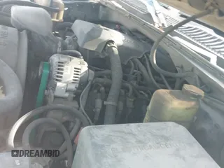 2000 Chevrolet Silverado 1500 LS z VIN 1GCEK19V5YE264057, wystawiony jako IAAI lot #41951426 z przebiegiem 251 674 mil mil oraz . Historia ofert i sprzedaży dostępna na DreamBid. Obrazek 20.