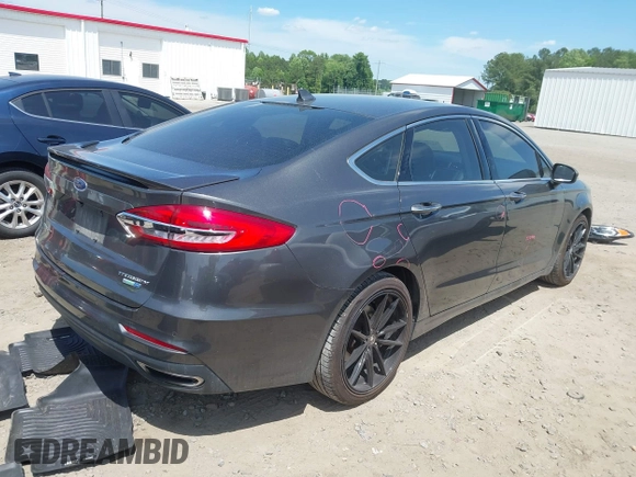 2019 Ford Fusion Titanium with VIN 3FA6P0D9XKR152617, listed as a IAAI auction lot 42209470 with 135,956 mi miles and . Bid and sale history available at DreamBid. Image 4.