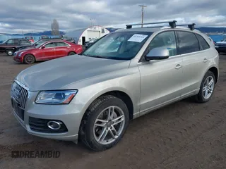 2014 Audi Q5 Premium Plus with VIN WA1CMAFP6EA063529, listed as a IAAI auction lot 41705364 with 154,501 mi miles and . Bid and sale history available at DreamBid. Image 18.