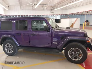 2023 Jeep Wrangler High Altitude z VIN 1C4HJXEN9PW560958, wystawiony jako IAAI lot #42393559 z przebiegiem 35 981 mil mil oraz . Historia ofert i sprzedaży dostępna na DreamBid. Obrazek 14.