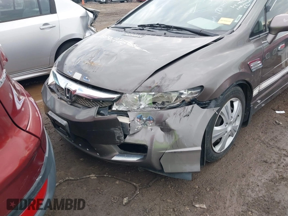2010 Honda Civic LX with VIN 19XFA1F58AE086425, listed as a IAAI auction lot 42225137 with 186,755 mi miles and . Bid and sale history available at DreamBid. Image 6.