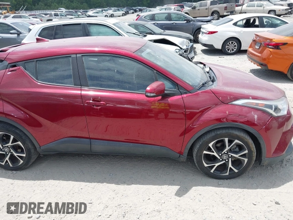 2018 Toyota C-HR XLE with VIN NMTKHMBX6JR054483, listed as a IAAI auction lot 42759739 with 89,820 mi miles and . Bid and sale history available at DreamBid. Image 13.