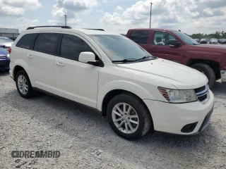 2013 Dodge Journey SXT with VIN 3C4PDDBG5DT615205, listed as a Copart auction lot 66553265 with 140,306 mi miles and Clean title. Bid and sale history available at DreamBid. Image 4.
