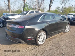 2017 Lincoln MKZ Hybrid Reserve z VIN 3LN6L5MU2HR634929, wystawiony jako IAAI lot #42065636 z przebiegiem 100 165 mil mil oraz . Historia ofert i sprzedaży dostępna na DreamBid. Obrazek 4.