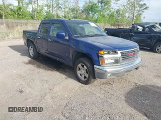 2009 GMC Canyon SLE1 with VIN 1GTCS139298121036, listed as a IAAI auction lot 41953007 with 230,957 mi miles. Bid and sale history available at carsss.com. Image 1.