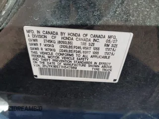 2007 Honda Ridgeline RTL w/Leather with VIN 2HJYK16577H547869, listed as a IAAI auction lot 41939741 with 248,916 mi miles. Bid and sale history available at carsss.com. Image 9.