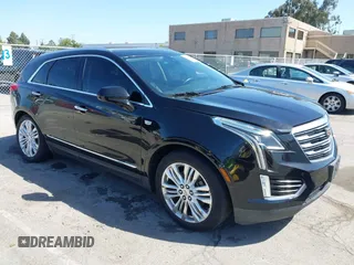 2017 Cadillac XT5 Premium Luxury FWD z VIN 1GYKNCRSXHZ209232, wystawiony jako IAAI lot #42270868 z przebiegiem 111 149 mil mil oraz . Historia ofert i sprzedaży dostępna na DreamBid. Obrazek 1.