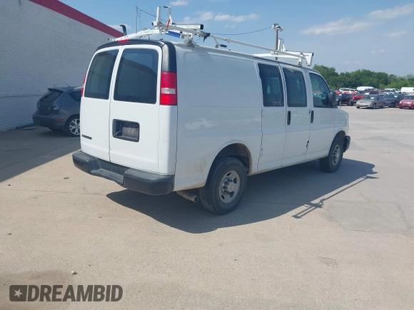 2019 Chevrolet Express Cargo Van with VIN 1GCWGAFPXK1164773, listed as a IAAI auction lot 41984554 with 87,916 mi miles. Bid and sale history available at carsss.com. Image 4.