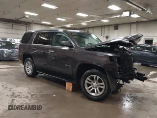 2015 Chevrolet Tahoe LT z VIN 1GNSKBKC1FR111299, wystawiony jako IAAI lot #41887115 z przebiegiem 157 666 mil mil oraz . Historia ofert i sprzedaży dostępna na DreamBid. Obrazek 1.