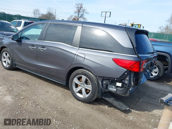2018 Honda Odyssey EX-L with VIN 5FNRL6H77JB101803, listed as a IAAI auction lot 41927622 with 147,587 mi miles. Bid and sale history available at carsss.com. Image 3.