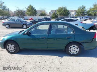 2001 Honda Civic LX with VIN 2HGES16551H567764, listed as a IAAI auction lot 41908288 with 137,740 mi miles. Bid and sale history available at carsss.com. Image 14.