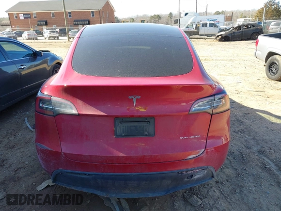 2023 Tesla Model Y Long Range with VIN 7SAYGDEE8PF709459, listed as a IAAI auction lot 41334108 with 51,544 mi miles. Bid and sale history available at carsss.com. Image 15.