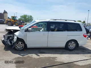 2007 Honda Odyssey EX-L with VIN 5FNRL38617B141003, listed as a IAAI auction lot 39232543 with 195,096 mi miles and . Bid and sale history available at DreamBid. Image 14.