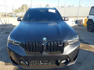 2024 BMW X3 M with VIN 5YM13EC03R9V14879, listed as a IAAI auction lot 41266018 with 21,055 mi miles. Bid and sale history available at carsss.com. Image 12.