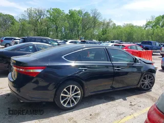 2013 Toyota Avalon XLE with VIN 4T1BK1EB3DU015055, listed as a IAAI auction lot 42086950 with 102,652 mi miles and . Bid and sale history available at DreamBid. Image 14.