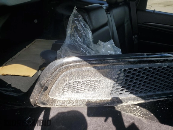 2017 Jeep Grand Cherokee Altitude z VIN 1C4RJFAGXHC828795, wystawiony jako Copart lot #53865265 z przebiegiem 65 152 mil mil oraz Szkoda całkowita • Salvage title. Historia ofert i sprzedaży dostępna na DreamBid. Obrazek 13.