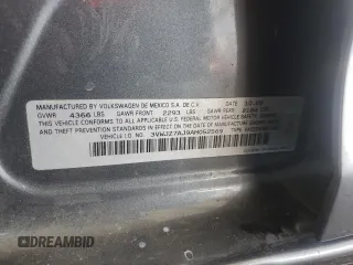 2010 Volkswagen Jetta S with VIN 3VWJZ7AJ9AM052569, listed as a Copart auction lot 59016965 with 166,950 mi miles and Salvage title. Bid and sale history available at DreamBid. Image 12.