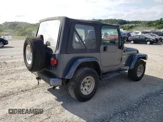 2002 Jeep Wrangler Sport с VIN 1J4FA49S02P734712, выставлен на аукционе Copart как лот 63310225 с пробегом 178 367 миль миль и Чистый • Clean title. История ставок и продаж доступна на DreamBid. Изображение 3.