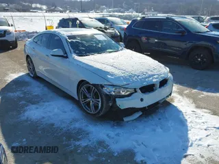 2016 BMW 4 Series 428i with VIN WBA4A9C50GG696366, listed as a IAAI auction lot 41615789 with 103,763 mi miles. Bid and sale history available at carsss.com. Image 1.