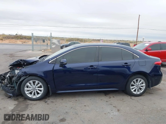 2023 Toyota Corolla Hybrid LE with VIN JTDBCMFE8PJ003081, listed as a IAAI auction lot 41041004 with 19,146 mi miles. Bid and sale history available at carsss.com. Image 14.