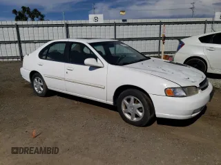1998 Nissan Altima XE with VIN 1N4DL01D1WC260737, listed as a Copart auction lot 44421064 with 117,023 mi miles and Salvage Title. Bid and sale history available at carsss.com. Image 4.