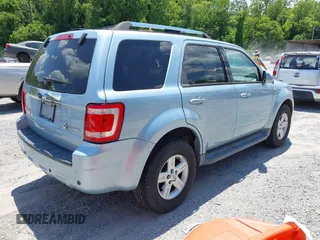 2008 Ford Escape Hybrid z VIN 1FMCU59H38KE68792, wystawiony jako IAAI lot #42557191 z przebiegiem 140 760 mil mil oraz . Historia ofert i sprzedaży dostępna na DreamBid. Obrazek 4.
